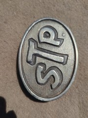 Vintage STP Corporation Belt Buckle from Level Cross NC