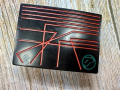 Unknown to me! Geometric Abstract Lines Red Over a Black Enamel Belt Buckle