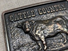 vintage CATTLE COUNTRY belt buckle BRASS cargill COW nutrena WESTERN cowboy
