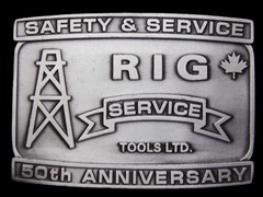 MA05142 2002 **RIG SERVICE TOOLS LTD.** 50th ANNIVERSARY PEWTER OILFIELD BUCKLE