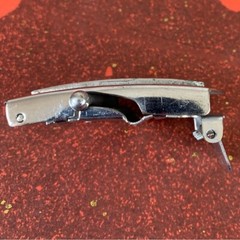 U.S. Navy belt buckle. “U.S.S. Algol AKA-54. Raised ship graphic.