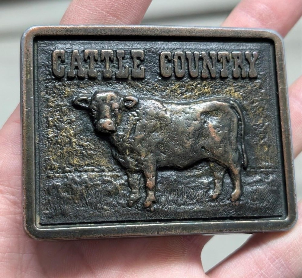 vintage CATTLE COUNTRY belt buckle BRASS cargill COW nutrena WESTERN cowboy