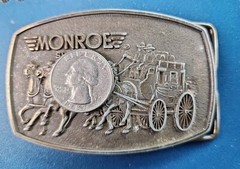 VTG 1980s MONROE SHOCKS BELT BUCKLE WILD WEST STAGECOACH SOFT RIDE