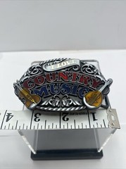 I Love Country Music belt buckle has a banjo violin and a guitar