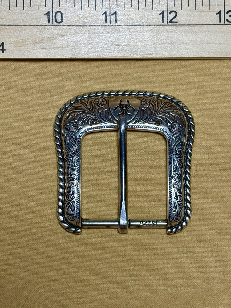 Ariat Western Belt Buckle Filigree Scroll Logo Silver Toned Rope Edge