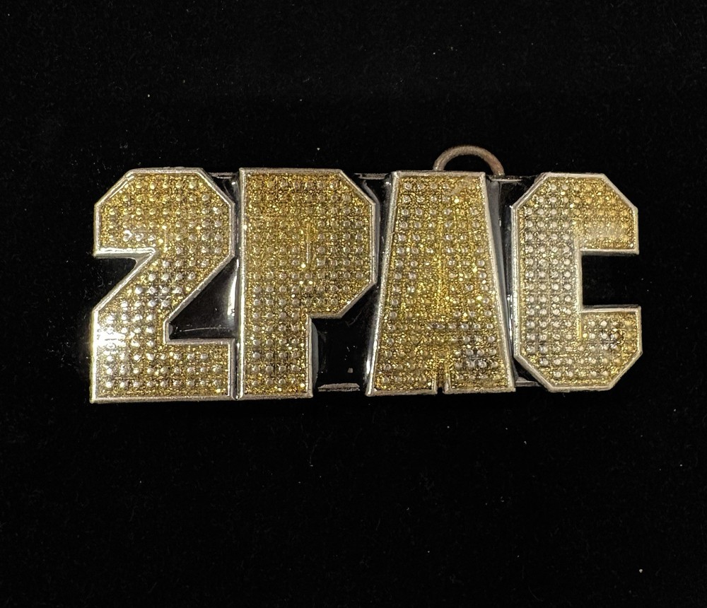 2006 vintage silver toned 2pac belt buckle featuring yellow rhinestones RARE
