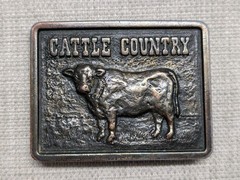 vintage CATTLE COUNTRY belt buckle BRASS cargill COW nutrena WESTERN cowboy