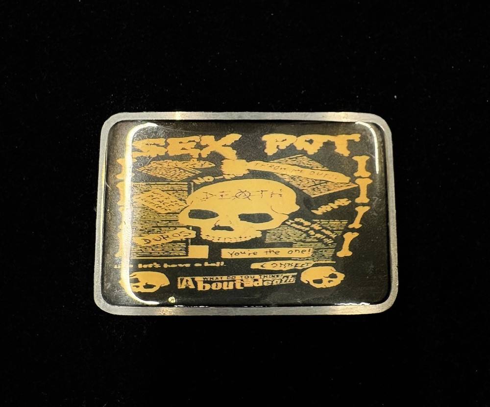 y2k punk Sex Pot Revenge belt buckle skull graphic on yellow background RARE