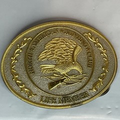 NORTH AMERICAN HUNTING CLUB LIFE MEMBER BELT BUCKLE WINGS OF GOLD OVAL 4X2.75”
