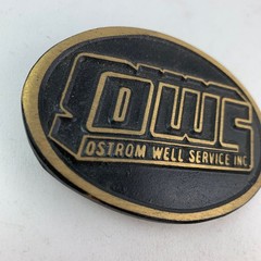 OWS Ostrom Well Service Belt Buckle Black Solid Brass DynaBuckle