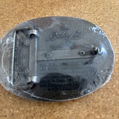 The Gal Leg Vintage Bronze Spinning Belt Buckle Collectible