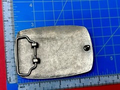 American Eagle With Wings Wide Flying High In Front Of Ribbon Belt Buckle