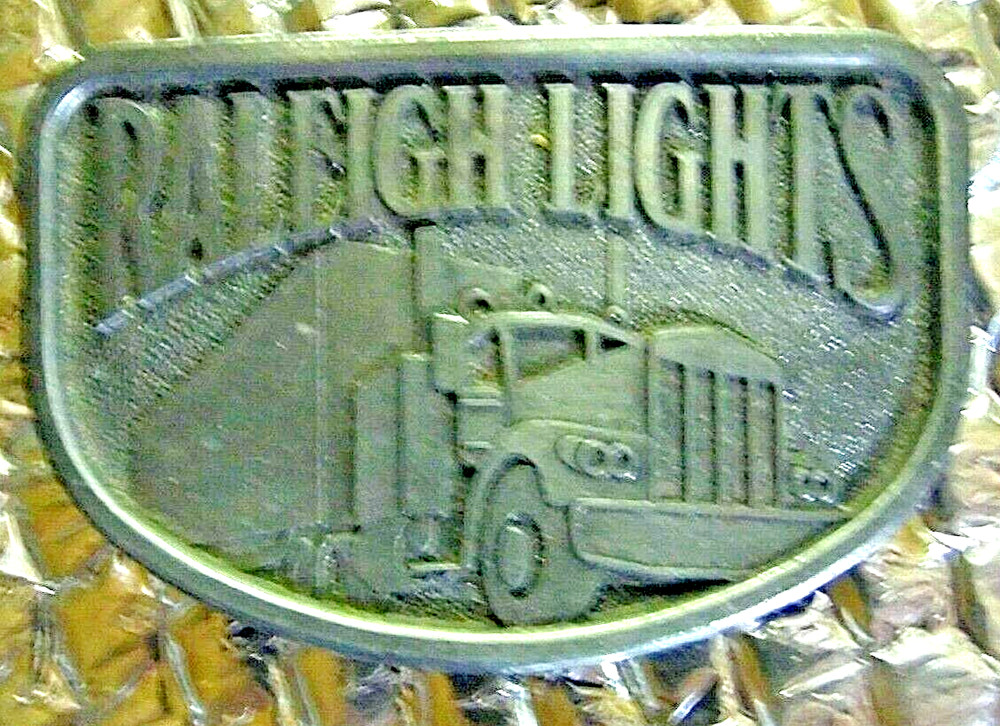 Raleigh Lights with Semi Truck Brass Belt Buckle FREE SHIPPING