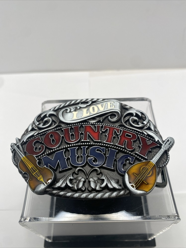 I Love Country Music belt buckle has a banjo violin and a guitar