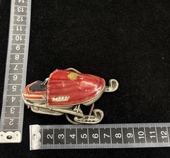 Vintage red and silver snowmobile belt buckle with detailed enamel work RARE