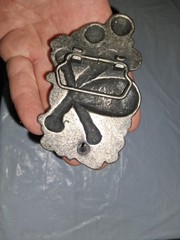 unbranded gothic belt buckle features a 3D pile of skulls and crossed bones…