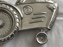 2004 Olander silver tractor belt buckle spinning back wheel