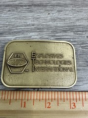 Explosives Technologies International ETI Belt Buckle Mens Brass Tone CD Hit