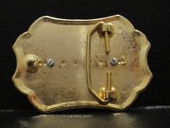 Western Style Belt Buckle Gold & Green in Color With Center Silver Prism Design