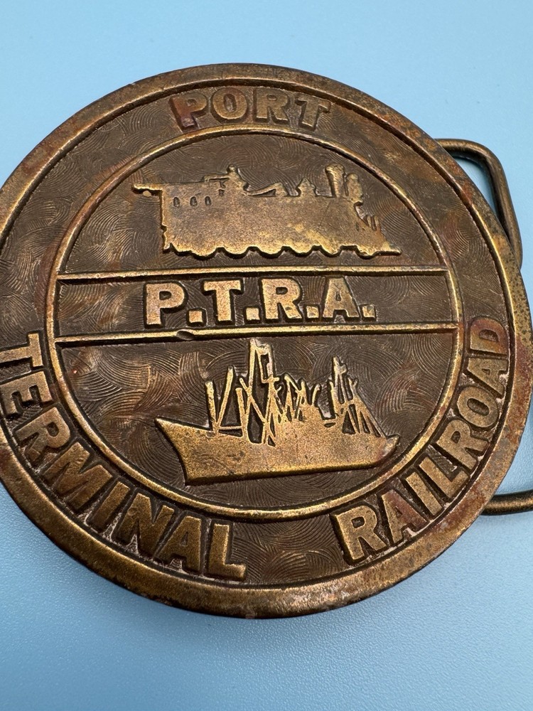P.T.R.A. Port Terminal Railroad Logo Metal Belt Buckle Vintage Jimm Watson 1977
