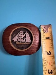 Belt buckle carved wood and pewter inlay of a sailboat
