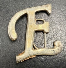 Bold Capital “E” Cut-Out Belt Buckle – Personalized Style Statement!