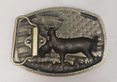 Beautiful high relief buckle showing a deer with mate against US flag.