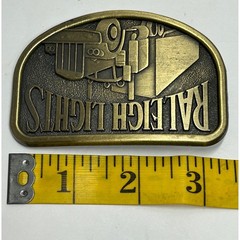 Vintage Raleigh Lights Semi Truck Belt Buckle Metal Antique Western Trucker