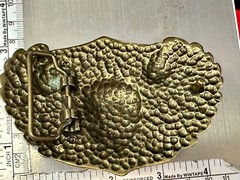 Dimensional Skull Head With Wings And Flowers – Raised Metal Belt Buckle