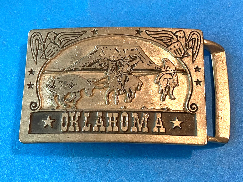 Vintage John E McCann Oklahoma Cowboy Bull Roping Riding Rodeo Belt Buckle