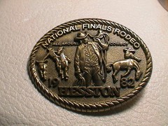 HESSTON NATIONAL FINALS 1982 BULL HORSE COWBOY WESTERN THEME BRASS BELT BUCKLE