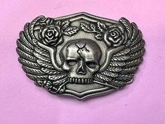 Dimensional Skull Head With Wings And Flowers – Raised Belt Buckle