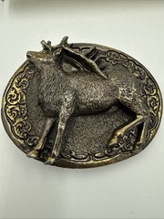 Stag Deer Belt Buckle Copyright 1981.Serial number 510. USA