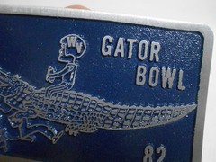 1982 Gator Bowl Belt Buckle WVU Football Player on Gator Unworn–Free Ship