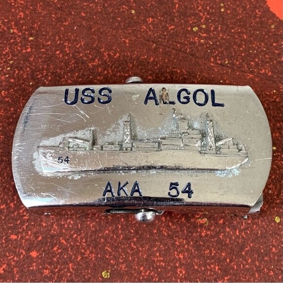 U.S. Navy belt buckle. “U.S.S. Algol AKA-54. Raised ship graphic.