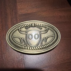 Gold tone metal Woody belt buckle