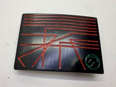 Unknown to me! Geometric Abstract Lines Red Over a Black Enamel Belt Buckle