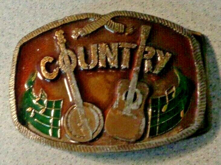 Vintage 1976 Indiana Metal Craft COUNTRY Belt Buckle music guitar banjo embossed