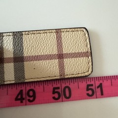 Burberry reversible belt in sand tone. polished metal buckle