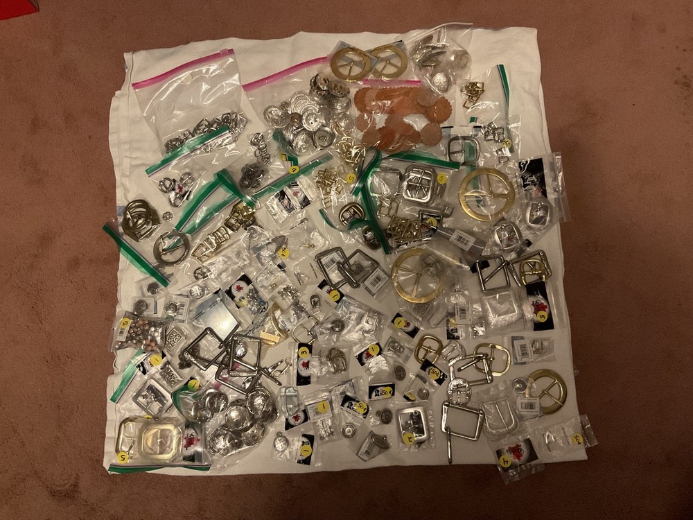 LOT OF 200 ITEMS: BUCKLES/ADDITIONAL ITEMS- VARIOUS STYLES AND DESIGNS – BOX 1