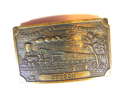 pre-owned brass « Silver City Mining Company Oregon » belt buckle w/ train scene