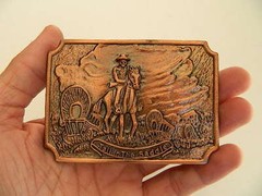 TALL IN THE SADDLE, WAGON TRAIL SCENE, BRASS COLOR, 2.5&Prime; X 3.5&Prime; BELT BUCKLE, NEW