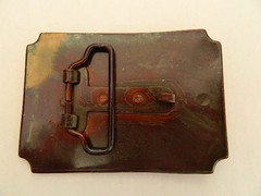 TALL IN THE SADDLE, WAGON TRAIL SCENE, BRASS COLOR, 2.5&Prime; X 3.5&Prime; BELT BUCKLE, NEW