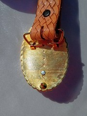 Tooled leather belt with western gold toned buckle w/tiger eye embellishment