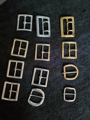 12 assorted Belt buckles
