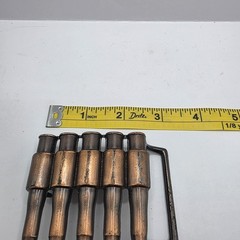 Vintage 1980&rsquo;s Metal bullet belt buckle copper tone gun ammunition. Hong Kong