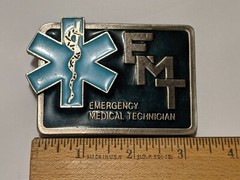 4 LOT BELT BELT BUCKLES GANJA, ELECTRICIAN, CORONA, EMT EMERGENCY TECHNICIAN
