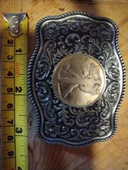 Western style belt buckle.steel with a walking liberty silver coin. 