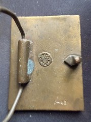BERGAMOT BRASS WORKS CHILD HOLDING FLOWERS METAL BELT BUCKLE