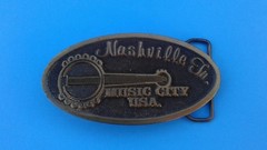 1976 A.J. DEZY DENVER -Nashville Music City U.S.A.- Brass Belt Buckle Limited